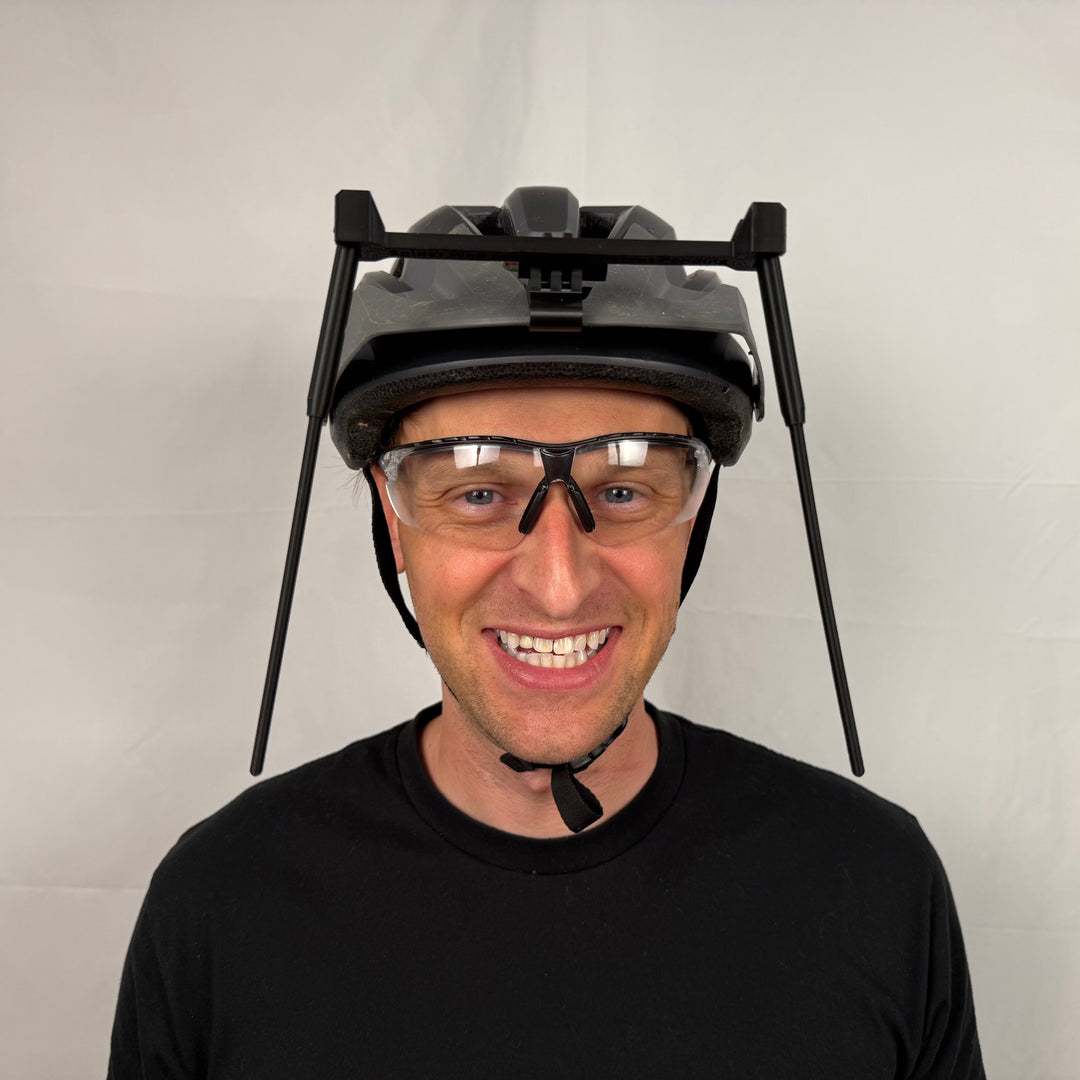 Spider Web Stick Attached to a Helmet Brim